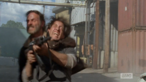After watching the wave of shooters cross his threshold, Rick jumps out and nabs the last shooter around the neck...