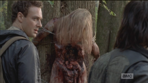 Aaron turns to Daryl. 